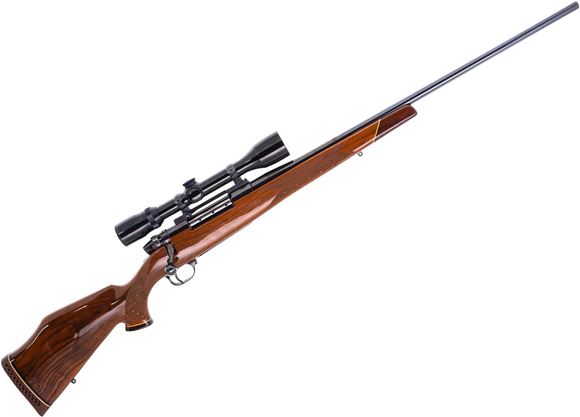 Picture of Used Weatherby Mark V Deluxe Bolt-Action Rifle, 30-06 Sprg, 24" barrel, Blued, Wood Stock, Bushnell Scopechief IV 4x40 Riflescope, Very Good Condition