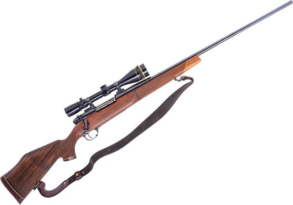 Picture of Used Weatherby Mark V Deluxe Bolt-Acton Rifle, 300 Wby Mag, 26" Barrel, Blued, Wood Stock, Leupold Vari-X III 3.5-10x40 Riflescope, Leather Sling, Varnish Stripped From Stock, Good Condition